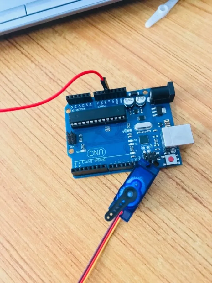 connect the other red jumper wire to 5V on Arduino Uno