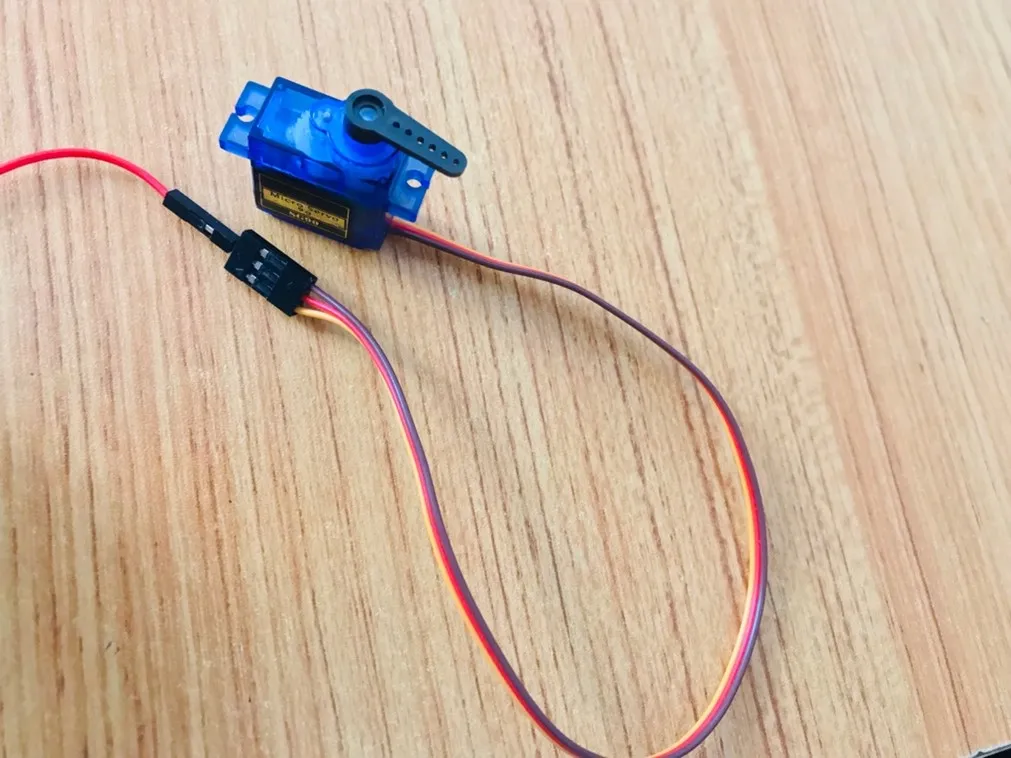 connect red jumper wire to red on Servo Motor