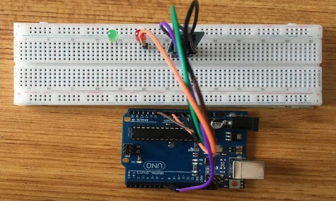 Orange wire fixed on breadboard