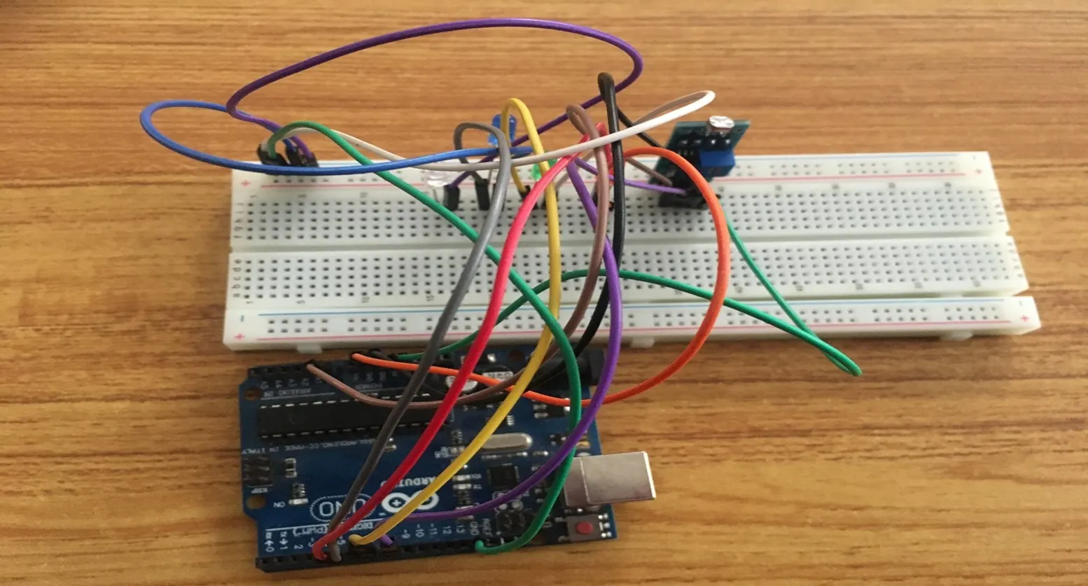 Violet wire fixed on breadboard