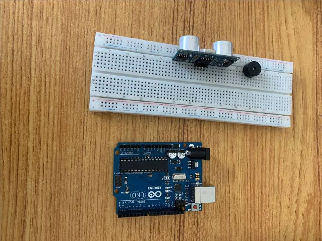 Mount the Buzzer on the Breadboard